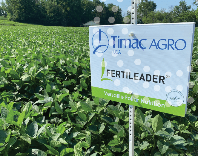 Soybean field with FERTILEADER sign