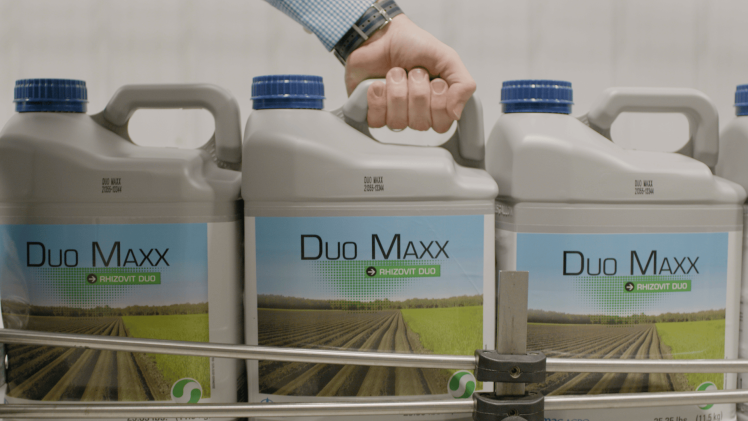 DUO MAXX NPK Stabilizer jugs in the manufacturing line.