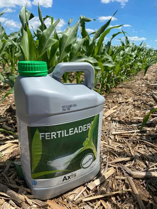 FERTILEADER AXIS jug in corn field.